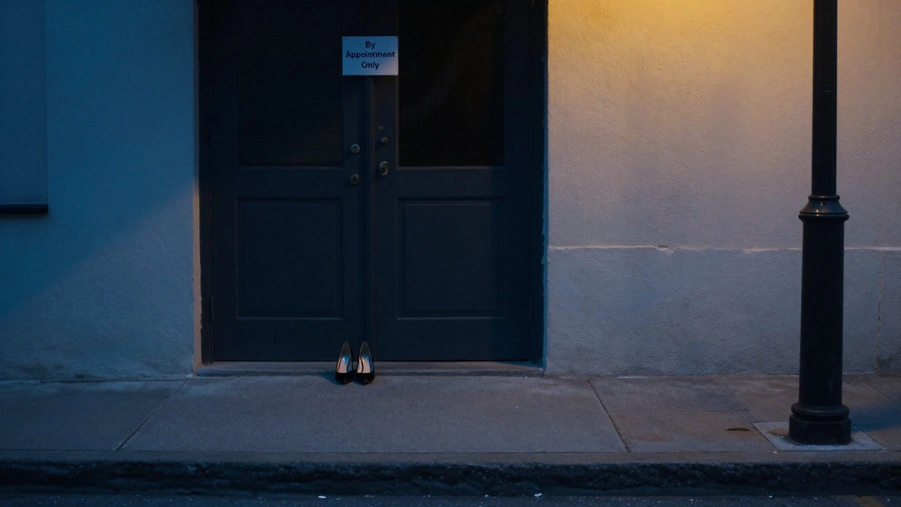 Empty high heels beside a closed door at dusk, suggesting a private, respected profession without exploitation.